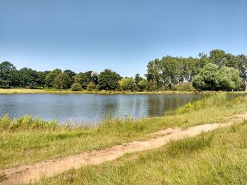 Scenic view of lake against clear sky