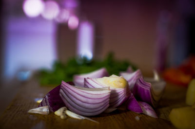 Close-up of pink roses on table