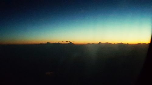 Scenic view of silhouette landscape against clear sky