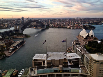 View of north sydney from the  custom house. the harbour bridge and opera house frame the photo. 