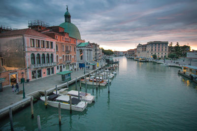 View of buildings in city during sunset