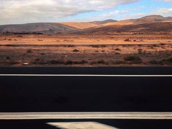 Scenic view of desert against sky