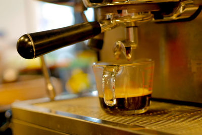 Close-up of coffee cup on table