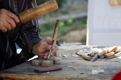 Man working on wood