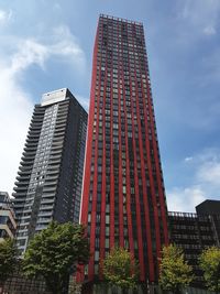 Low angle view of skyscrapers against sky