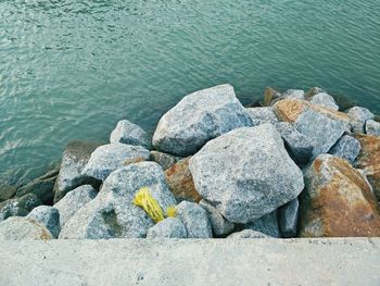 Close-up of rocks by sea