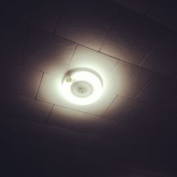 Low angle view of illuminated lamp