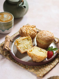 Vanilla soes cakes or soes vla served in plate. selective focus