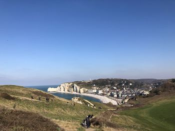 Scenic view of landscape against clear blue sky