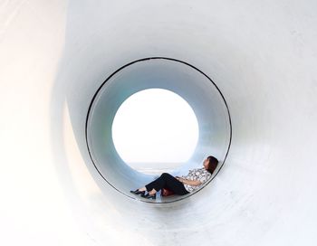 People sitting on wall