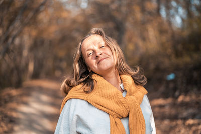 Portrait of a smiling young woman in winter