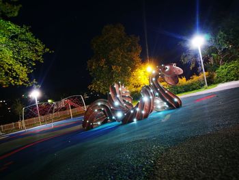 Light trails on road at night