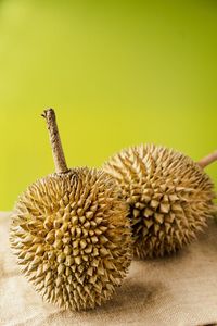 Close-up of fruit over white background