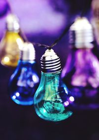 Close-up of illuminated light bulb