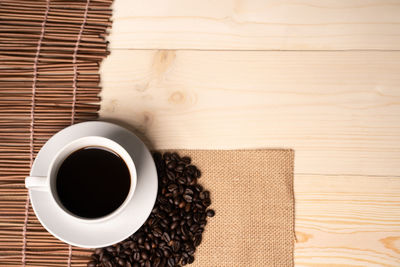 Directly above shot of coffee cup on table