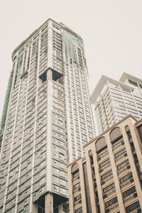 Low angle view of modern buildings against clear sky