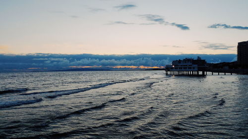 Scenic view of sea against sky at sunset