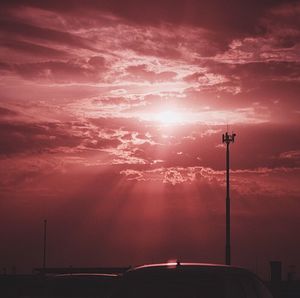 Car against sky during sunset