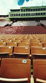 Empty chairs in stadium