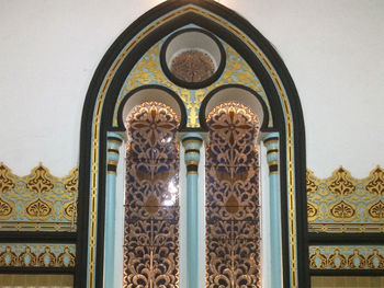 Low angle view of ornate door of building