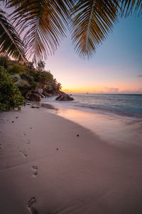 Scenic view of sea against sky at sunset