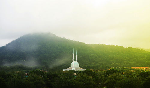 View of a building with mountain in background