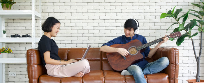 Young man playing guitar