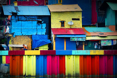 Full frame shot of multi colored building against blue sky