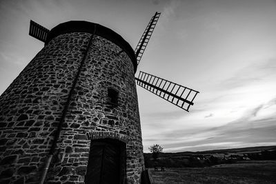 Low angle view of traditional windmill against sky in warnstedt - harz mountains 