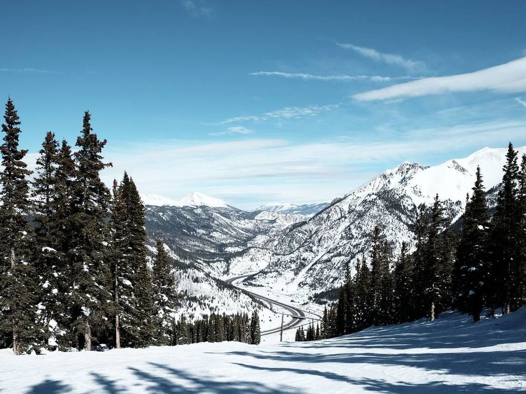 SNOWCAPPED MOUNTAINS AGAINST BLUE SKY