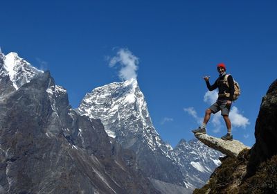 Scenic view of snowcapped mountain against sky