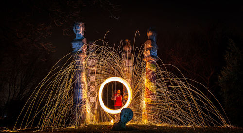 Light trails with fire crackers at night