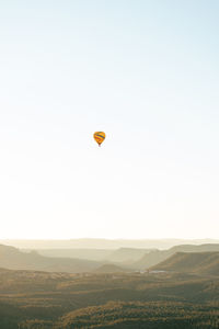 Hot air balloons against clear sky