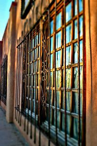 Close-up of metal grate window