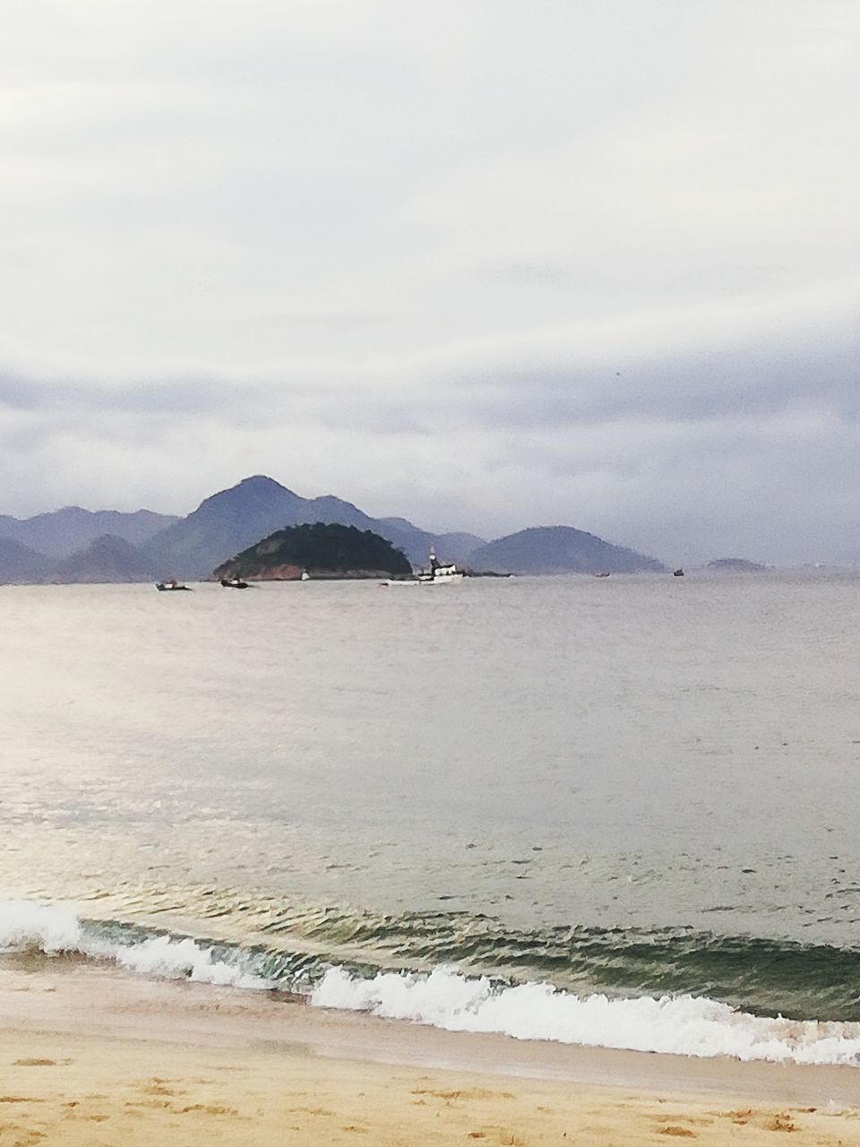 water, land, beach, sea, sky, beauty in nature, scenics - nature, mountain, cloud - sky, tranquility, tranquil scene, nature, no people, sand, day, outdoors, motion, idyllic, wave