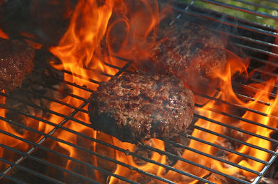 Close-up of meat on barbecue grill