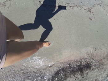 Low section of people on beach