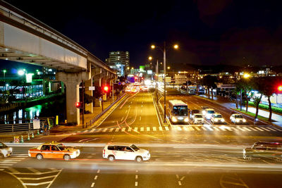 Traffic on city street at night