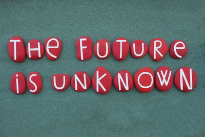 High angle view of text on red background