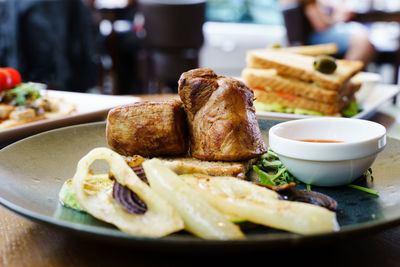 Close-up of food served on table