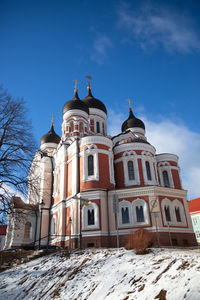 Low angle view of building against blue sky