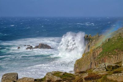 Scenic view of sea against clear blue sky