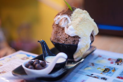 Close-up of ice cream in plate on table