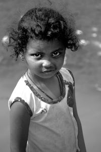 Portrait of girl standing outdoors