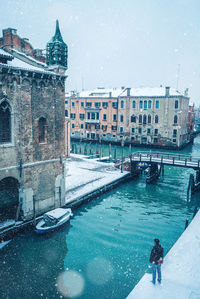 View of buildings in city during winter