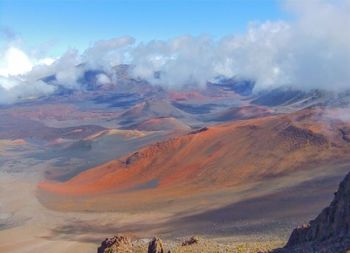 Aerial view of volcanic landscape against sky