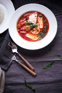 Directly above shot of soup in bowl on table