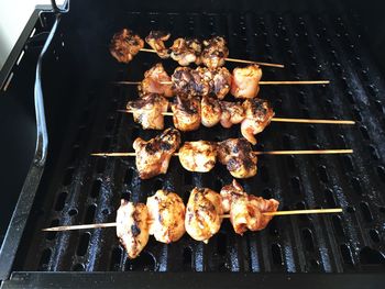 Close-up of meat on barbecue grill