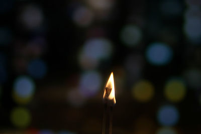 Close-up of illuminated candles