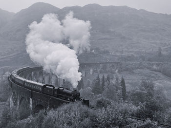 Steam train on a viaduct